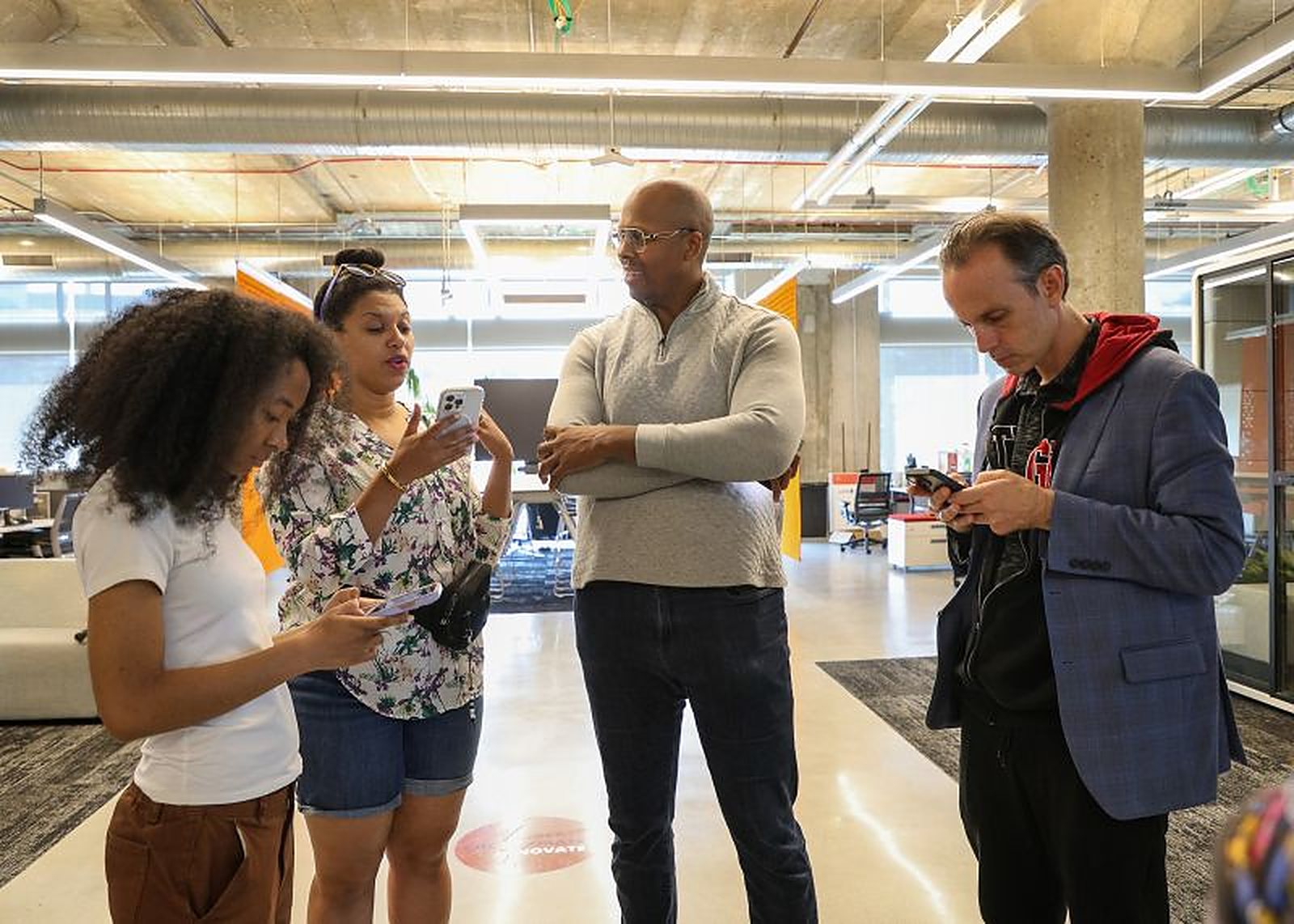 Founders and ecosystem builders trading contacts at the Black Tech Week HustleBus Road Show