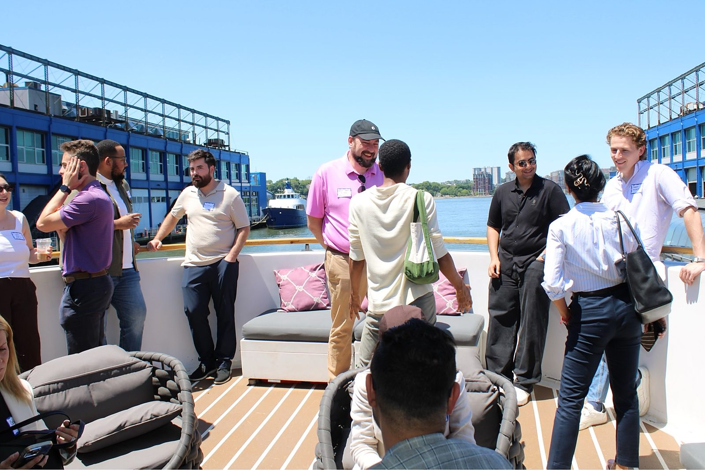 Investors, founders and ecosystem builders mingling on the sundeck of the Hornblower Lexington at the Heartland Venture Summit, NY Tech Week 2026